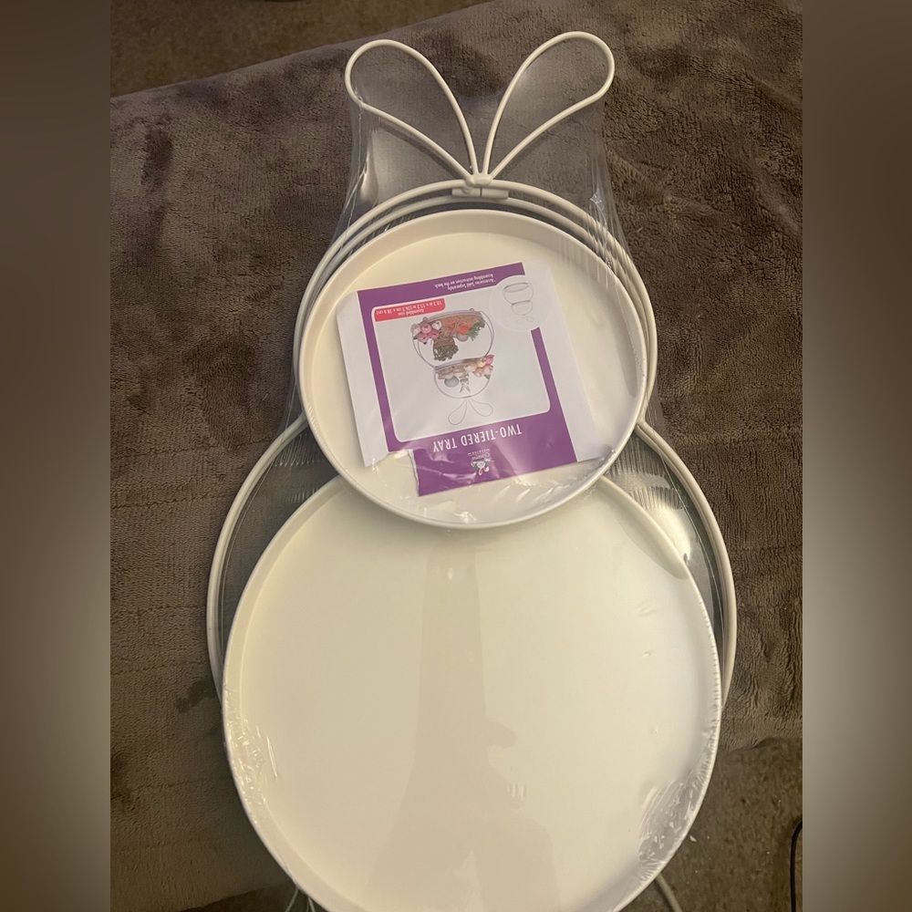 This is a brand new , in shrink wrap , two tiered bunny tray.